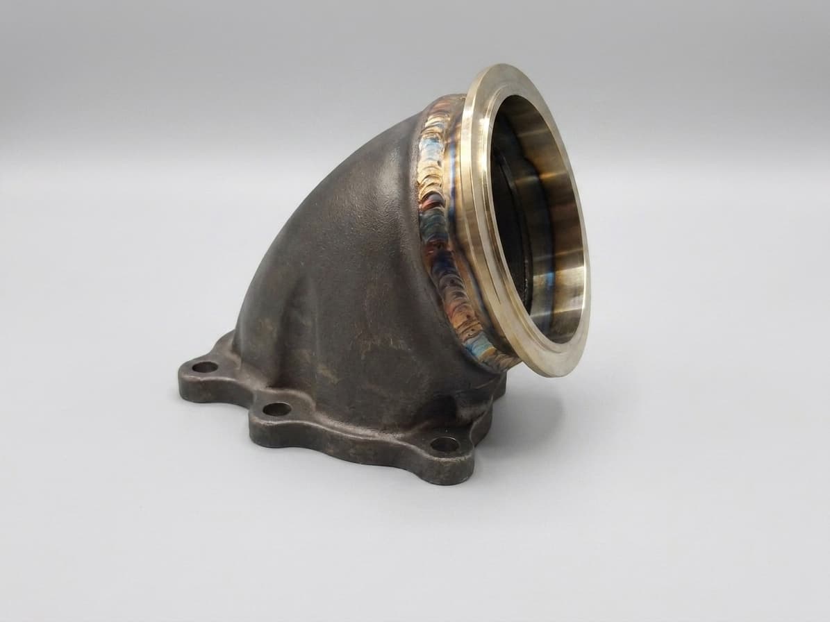 Welded 3 inch stainless V-band ring on a Kraken GT 5-bolt cast adaptor elbow